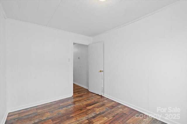 empty room featuring hardwood / wood-style flooring