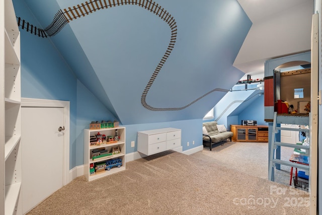 playroom with baseboards, carpet floors, and vaulted ceiling