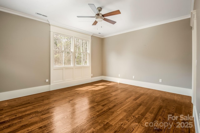 14 Twinflower Trl, Asheville, NC 28804 - unfurnished room featuring ceiling fan, ornamental molding, visible vents, wood finished floors, and baseboards