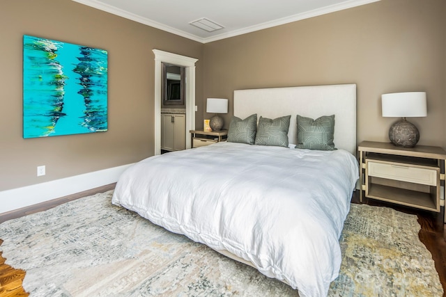 14 Twinflower Trl, Asheville, NC 28804 - bedroom with wood finished floors, baseboards, ornamental molding, and visible vents