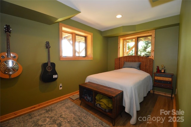 bedroom featuring multiple windows, recessed lighting, wood finished floors, and baseboards