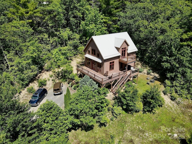 bird's eye view featuring a forest view