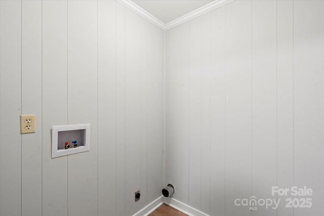 laundry area with laundry area, ornamental molding, and hookup for a washing machine