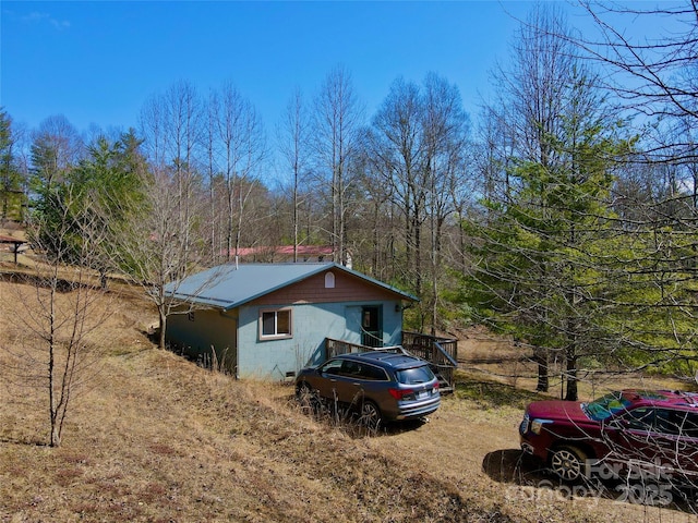 view of home's exterior with concrete block siding