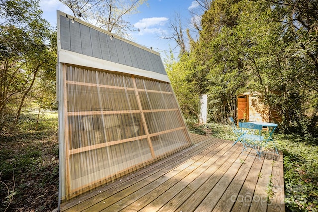 deck with an outbuilding