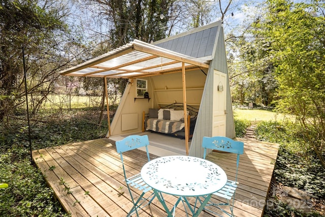 deck featuring an outbuilding