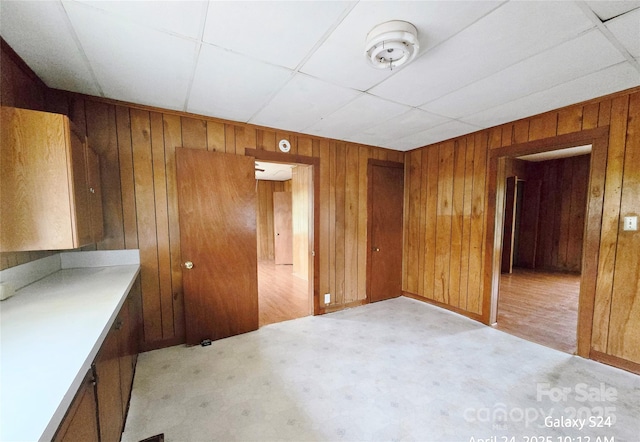410 Cole Campbell Rd, Taylorsville, NC 28681 - empty room with wood walls and light floors
