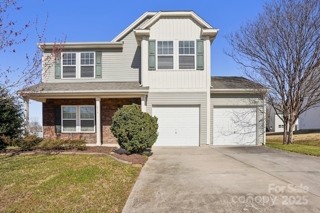 view of front facade with a garage, driveway, a front lawn, and board and batten siding