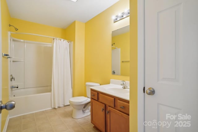 full bathroom featuring tile patterned flooring, shower / bath combo with shower curtain, toilet, and vanity