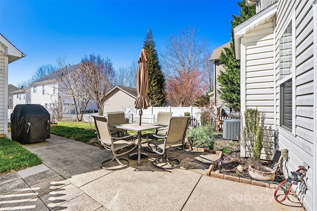 view of patio / terrace with central air condition unit, area for grilling, outdoor dining space, and fence