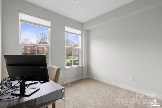 office featuring carpet and baseboards