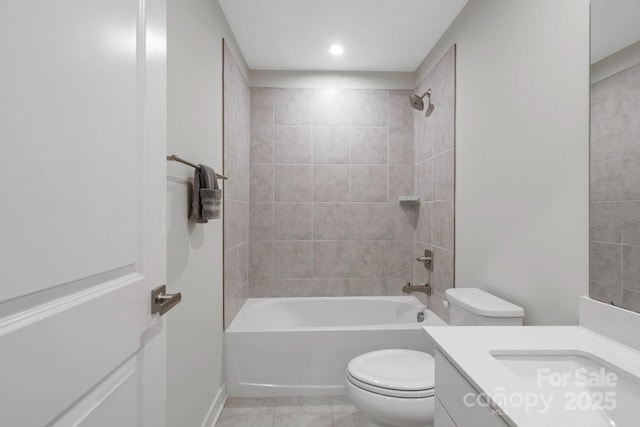 bathroom with shower / tub combination, vanity, toilet, and tile patterned floors