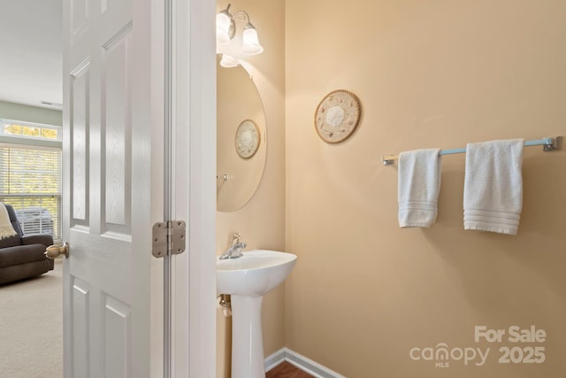 bathroom featuring baseboards