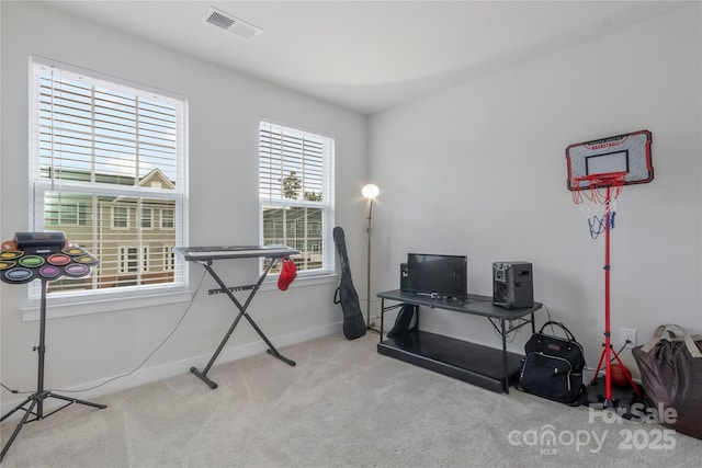 home office featuring visible vents, baseboards, and carpet floors