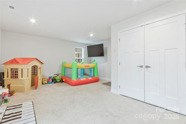 rec room with carpet flooring, recessed lighting, baseboards, and visible vents