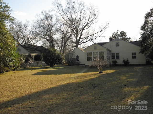 exterior space with a yard