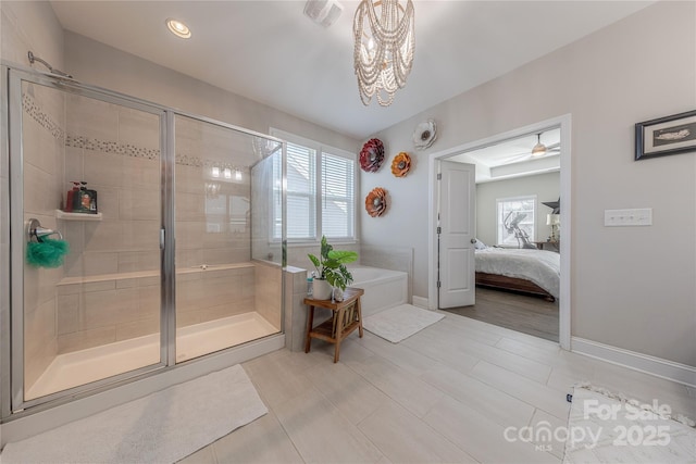 ensuite bathroom featuring baseboards, visible vents, ensuite bath, a shower stall, and a bath