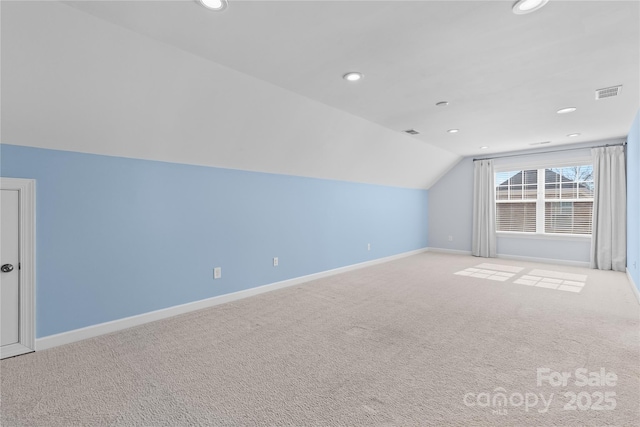 bonus room featuring visible vents, baseboards, carpet floors, vaulted ceiling, and recessed lighting