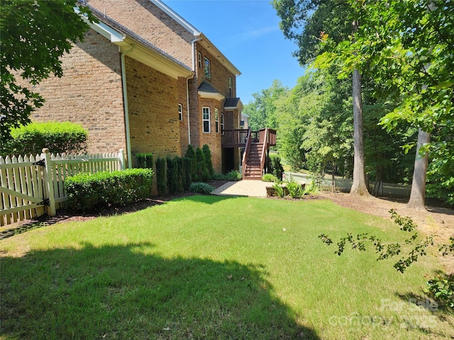 4708 Pearmain Dr, Waxhaw, NC 28173 - view of yard featuring stairway and a wooden deck