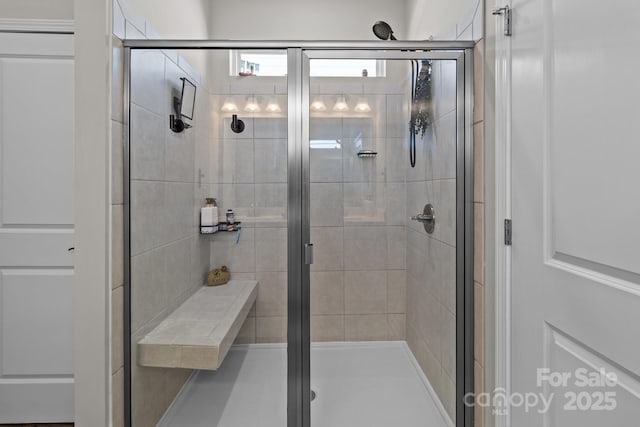 bathroom featuring a stall shower