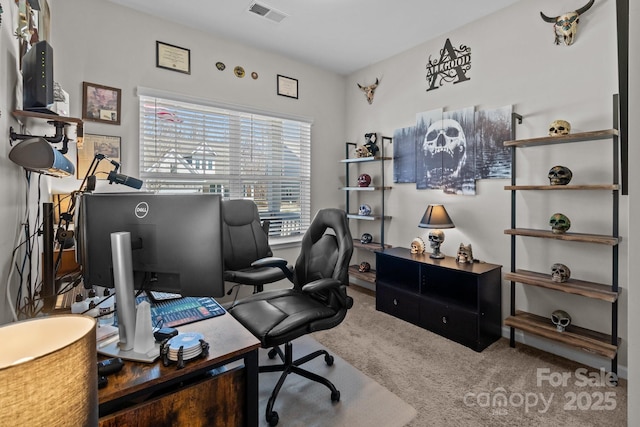 carpeted home office with visible vents