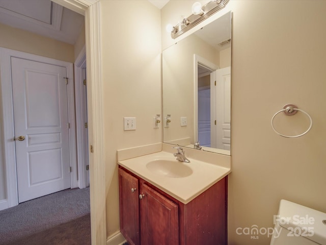 bathroom with vanity and visible vents