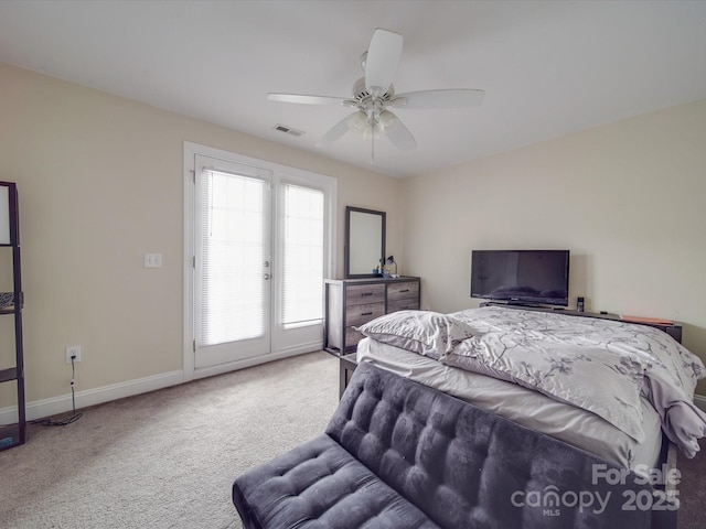 bedroom featuring carpet floors, a ceiling fan, baseboards, visible vents, and access to exterior