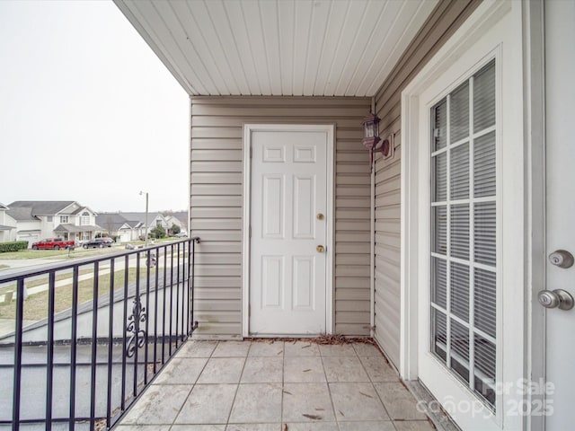 balcony featuring a residential view