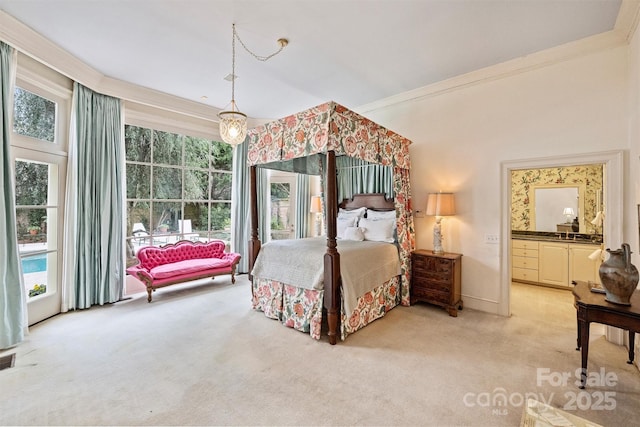 bedroom featuring multiple windows, light carpet, and crown molding