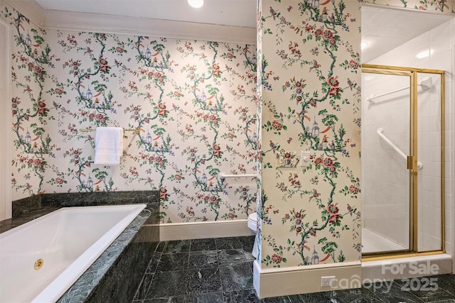 full bath featuring wallpapered walls, baseboards, toilet, a garden tub, and a stall shower