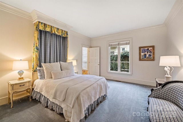 bedroom featuring baseboards, dark carpet, and crown molding