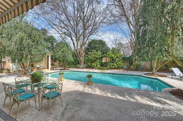 pool featuring a patio