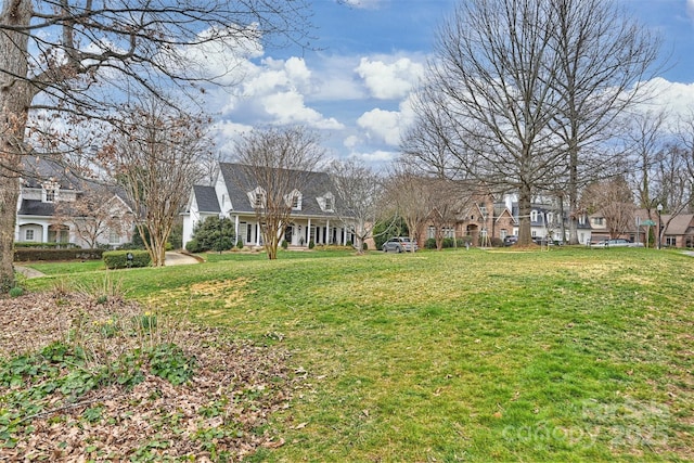 view of yard featuring a residential view