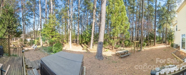 view of yard with a wooden deck