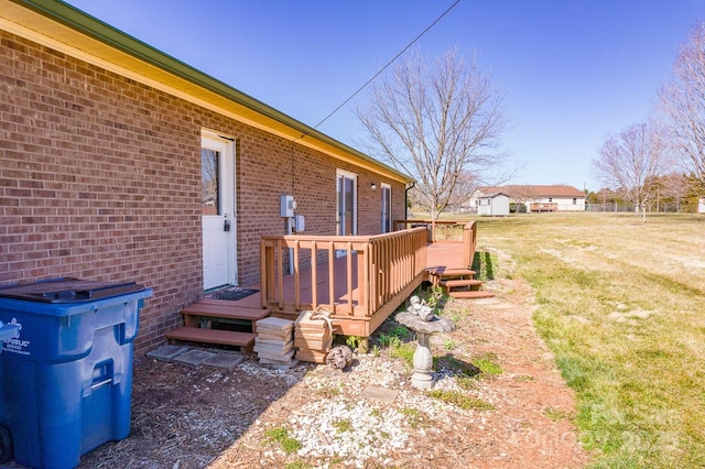 exterior space with a wooden deck and an outdoor structure