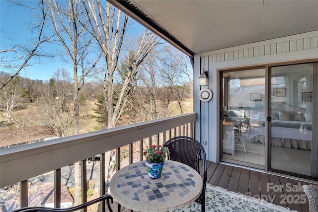 balcony with outdoor dining area