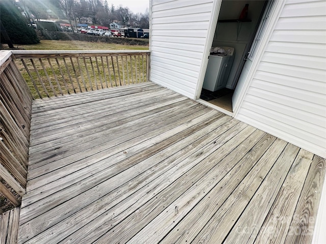 wooden terrace featuring washer / dryer