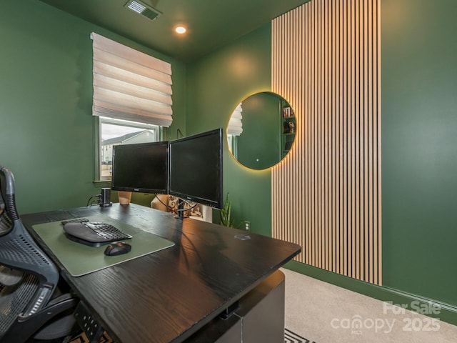 office featuring recessed lighting, visible vents, and carpet flooring