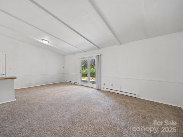 carpeted spare room featuring vaulted ceiling with beams and a baseboard heating unit