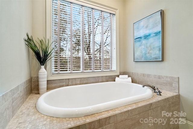 bathroom featuring a bath