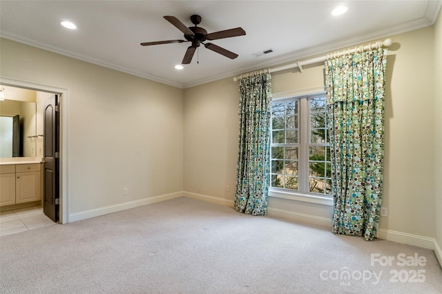 unfurnished bedroom featuring light carpet, visible vents, recessed lighting, and crown molding