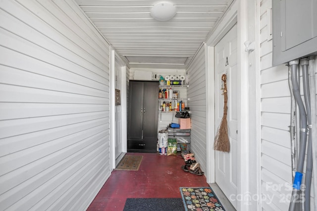 property entrance featuring electric panel
