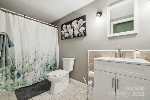 33 Milburn Ln, Hendersonville, NC 28792 - full bath featuring tile patterned flooring, curtained shower, baseboards, toilet, and vanity