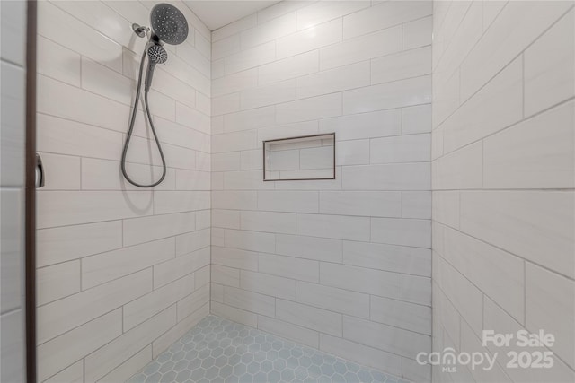 bathroom with a stall shower