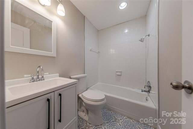 bathroom featuring vanity, toilet, bathtub / shower combination, and tile patterned flooring