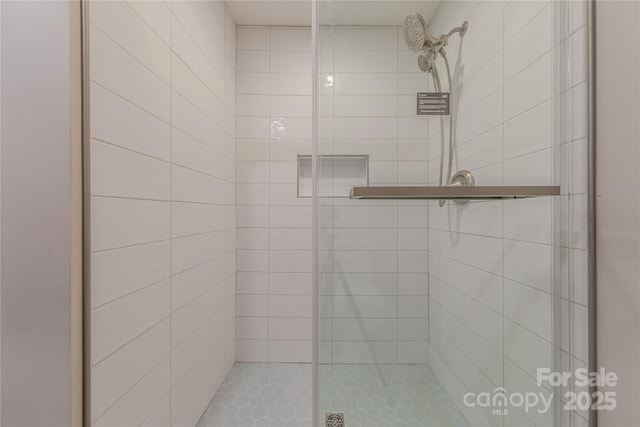 full bathroom featuring a shower stall