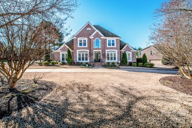 view of front of property featuring brick siding