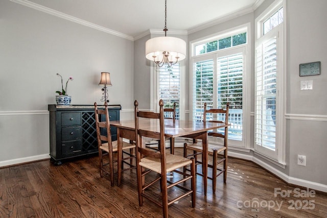 dining area featuring a chandelier, baseboards, dark wood finished floors, and crown molding