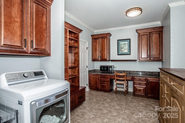 laundry area with cabinet space, washer / clothes dryer, and ornamental molding