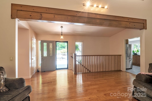 97 Ballantree Dr, Asheville, NC 28803 - foyer with light wood-style floors, beamed ceiling, and baseboards